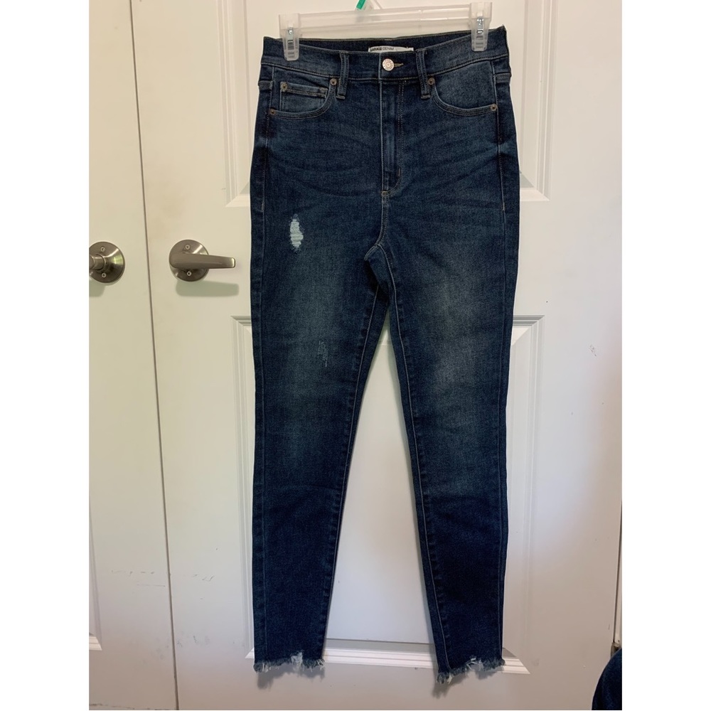 Garage jeans size 5 dark wash frayed ankles on bottom.